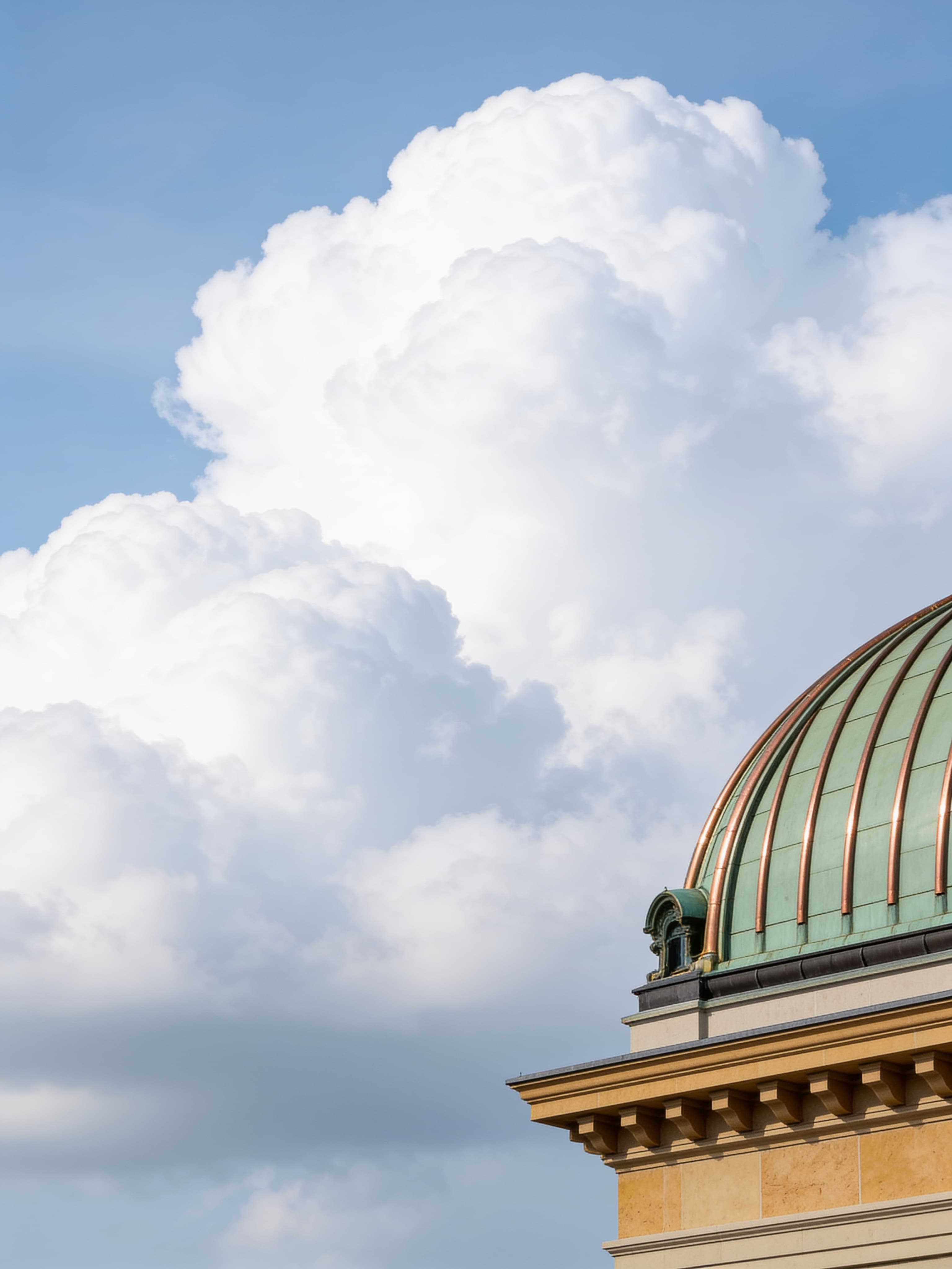 Clouds above the copper dome of a Swiss government building